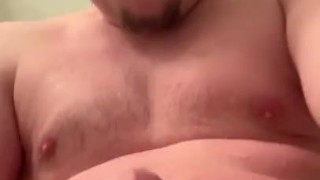 Chubby guy steps out of the shower to cum, jizz on thighs