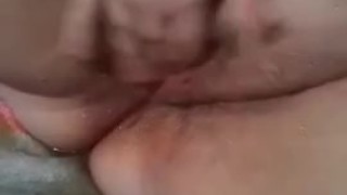 Little slut fucks herself until she squirts 