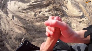 GIRLFRIEND GIVES RISKY QUICK HANDJOB AT A PUBLIC BEACH