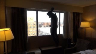 wetsuited masked horny guy comes onto hotel room window