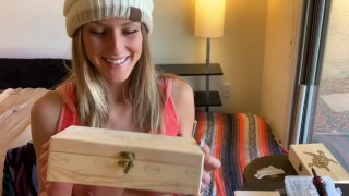 Miss Stacy shows off her woodburning art!