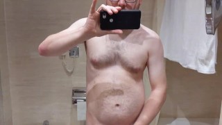 Masturbating and shooting thick load in hotel room bathroom on conference visit