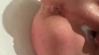 Anal toying in the tub 
