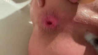 Anal toying in the tub 