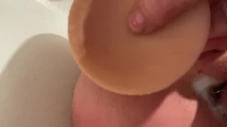 Anal toying in the tub 