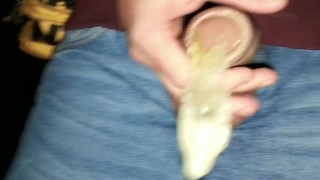 Twink fills cum filled condom even more and SWALLOWS all that cum