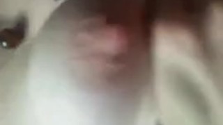 Moaning while playing with my tits. 