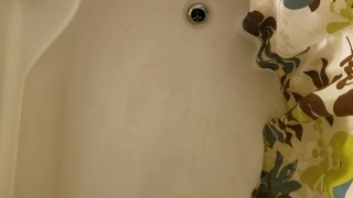 Guy Pees in the Shower while still in Chastity