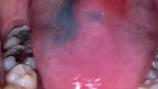 Teen girl eating candy mouth up close pov 