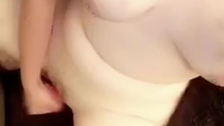 Curvy white teen fucks herself with a big pink dildo