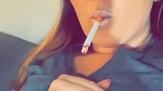 Hot Cam Girl Smokes While Rubbing Her Tits