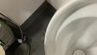 Having a risky wank in public toilets 