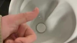 Having a risky wank in public toilets 