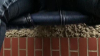 Curvy MILF pulls her pants down and pisses outside on deck in public