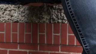 Curvy MILF pulls her pants down and pisses outside on deck in public