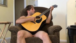 Nude Hairy Stud Guitar Playing
