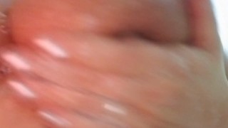 Wife soaping up her huge natural hhh tits in the shower 