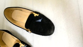 Cumshot on slippers of a young bitch