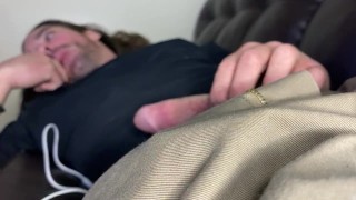 On couch playing with big Irish cock