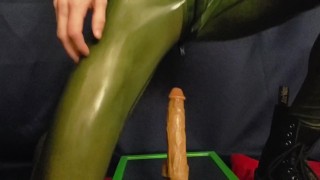 Transparent green latex and a 12 inch dong
