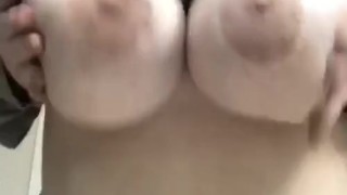 Teen plays with her giant natural tits 