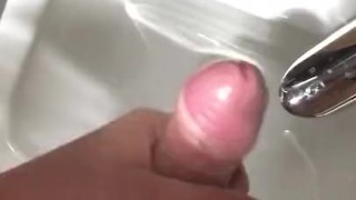 Teen masturbates and cums in public toilet