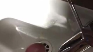 Teen masturbates and cums in public toilet