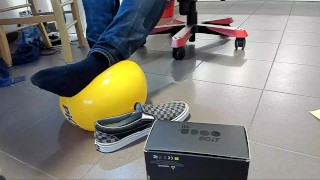 Male Shoeplay with beach ball in Under Armor, Vans Slip Ons, Black Socks