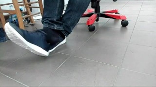Male Shoeplay with beach ball in Under Armor, Vans Slip Ons, Black Socks
