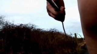 Naked with and without penis pump at side of busy road