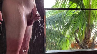 honeymoon couple taking a romantic shower after sex on paradise island