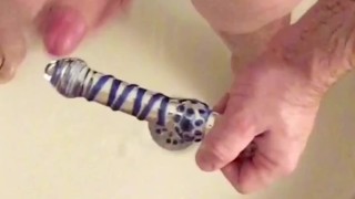 Foreskin docking/stroking using glass dildo then cum on dildo & suck clean.