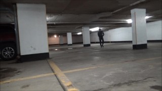 wetsuited & masked in parking garage