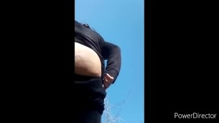 Walking around with a butt plug and fucking myself in a public bathroom