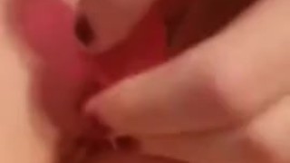 Redhead cumming all over her pink beads and wanting more...........