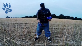 Baggy-Skater-Pup pawing off out on field sniffing Airmax 270