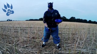 Baggy-Skater-Pup pawing off out on field sniffing Airmax 270