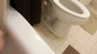 Piss slave peeing all over herself and fingering her pussy till she cums!