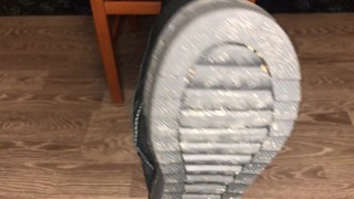 Student girl show nylon socks, boots and foot after study
