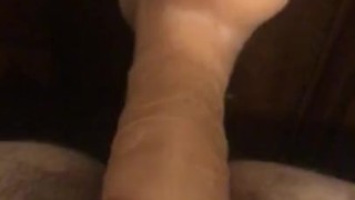 Lonely wife teasing self with dildo