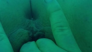 Finger fucking in a tanning bed 