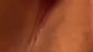 Toying her pink pussy