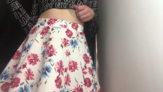Beauty changes clothes in the dressing room.