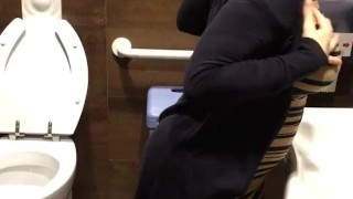 Masturbation in a public toilet