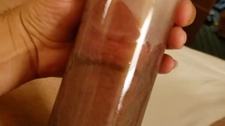 Pumping dick and balls with cum shot