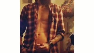 Bearded muscular guy jerking off cums and eats it