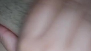 Brunette shows her pussy while masturbating