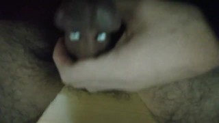 Masturbation with a penis ring.