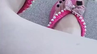 tici_feet @tici_feet dangling the flip flop