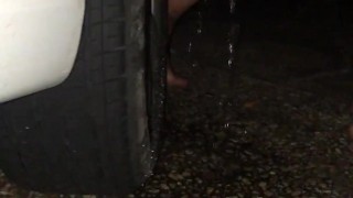 Naughty girl piss on car tire (Busting)